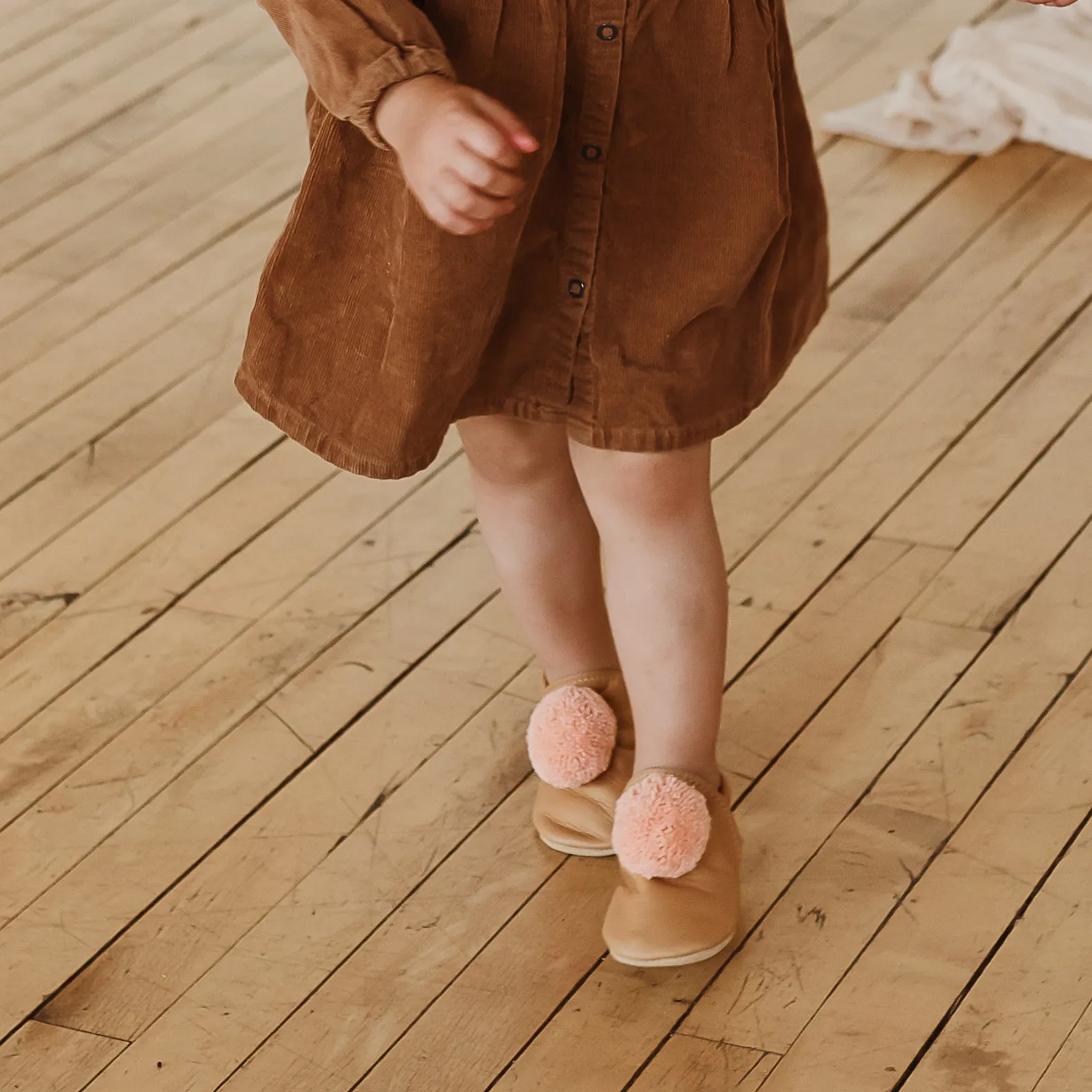 leather pompom shoes